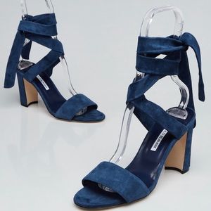 Blue suede tie around Manolo Blahnik sandals.